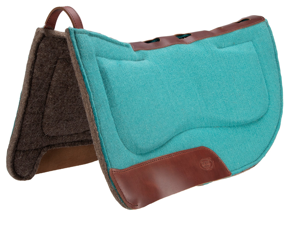 Western-style saddle pad with contoured spine, wither relief, thick felt pad for reduced slipping and sliding. Features shock absorption, secure fit, wear leathers with extra padding, and sweat absorption for a comfortable ride.