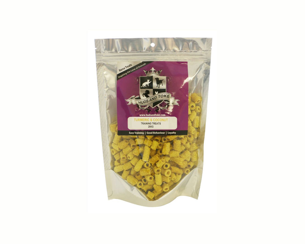 Happy Horse Training Treats - Coconut & Turmeric - Alt text: A pile of crunchy horse training treats with a mixture of coconut and turmeric, featuring a blend of wholesome ingredients for horses.