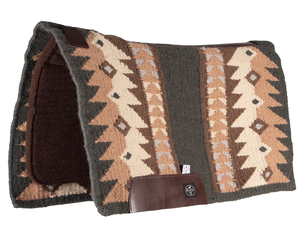 fusion saddle pad is a combination of a hand-woven New Zealand wool blanket top and a 100% steam pressed wool felt pad, providing superior cushioning and impact protection