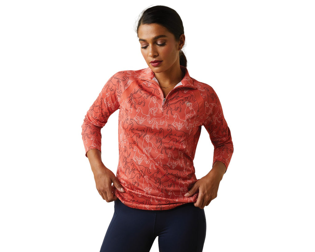 Ariat Ladies Sunstopper in Burnt Sienna - Same great performance features but now with a raglan-cut sleeve for a flattering fit and breathable tech mesh paneling in all the places you need it most