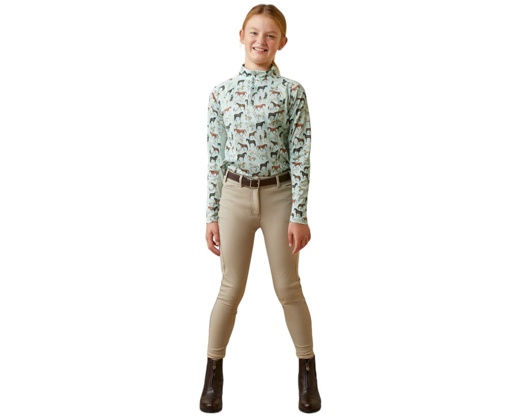 Ariat Youth Sunstopper in Aqua Foam - features Breathable mesh panelling, Stand collar with 1/4 zip styling, and Lightweight recycled polyester / spandex blend pique knit
