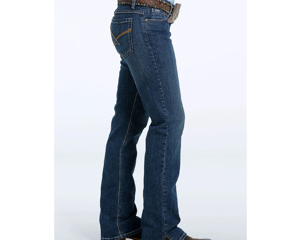 The dark stonewash Kylie is performance ready, constructed of form-fitting stretch denim, complemented with whiskers and is graced with a simple, camel-coloured signature stitch on the back pockets. The kick slit at the leg opening allows this jean to stack perfectly on top of boots.