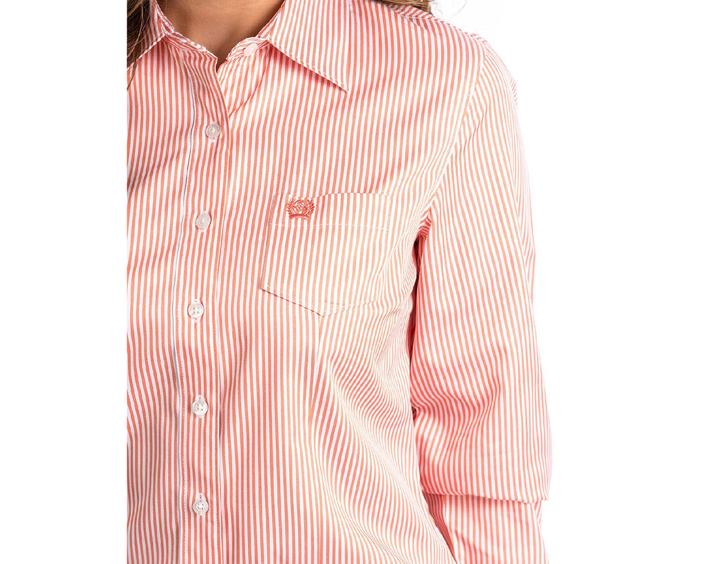 CINCH women’s shirts are designed to provide classic and timeless fashion for women in and out of the arena. CINCH women’s shirts have extra-long tails so they stay tucked in and longer sleeves for added range of motion while riding or roping. Our women’s shirts come in a variety of solids, stripes, prints and plaids and are offered in many vibrant colours.