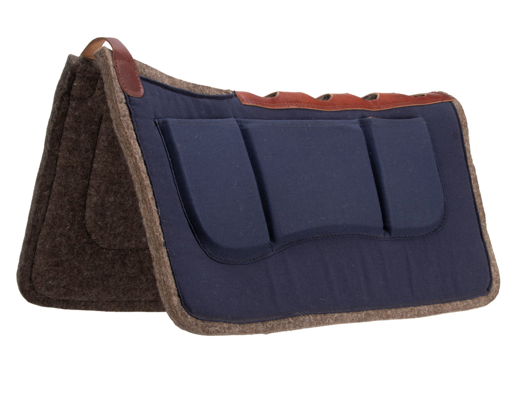 Navy canvas shim pad with contoured design, wither relief notch, and spine leathers. Made from durable cotton and high-density premium wool felt for pressure relief and shock absorption. Improves saddle fit and enhances riding experience