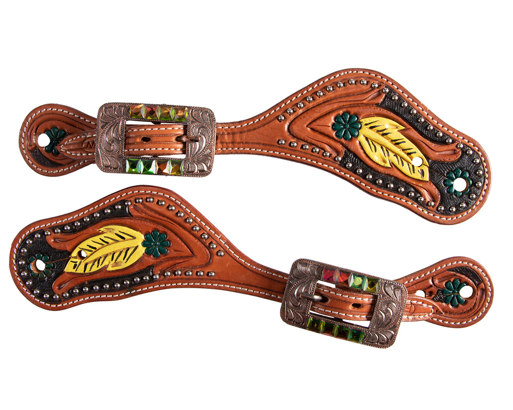 Handcrafted Cheyenne collection showcasing sophistication and style. Genuine leather adorned with yellow feathers, turquoise flowers, and jewelled buckles. Superior attention to detail, stainless steel hardware, and painted Native American Cheyenne design.