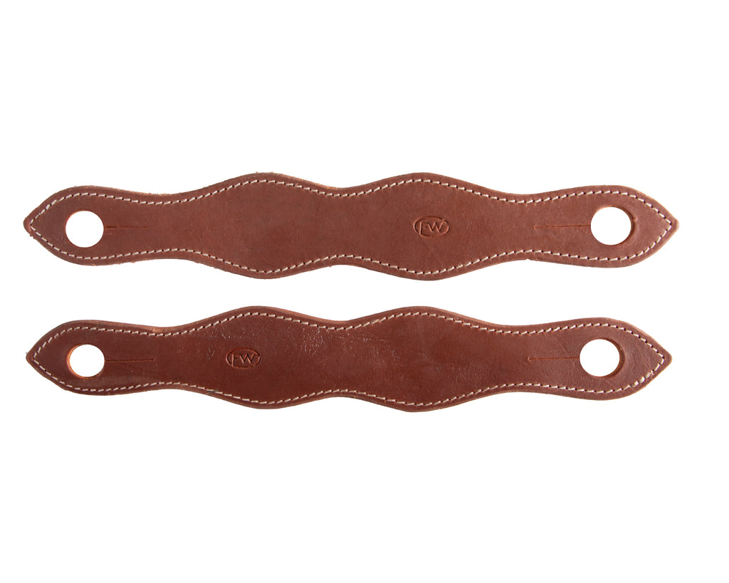 Fort Worth® Slobber Straps: Crafted from premium American leather, these slobber straps are a top-quality addition to your riding tack. Handcrafted with superior craftsmanship, some styles feature exquisite hand tooling. Attach your reins to the bit with these reliable slobber straps. With Fort Worth® products, you can trust in 100% quality materials and construction for exceptional performance every time.