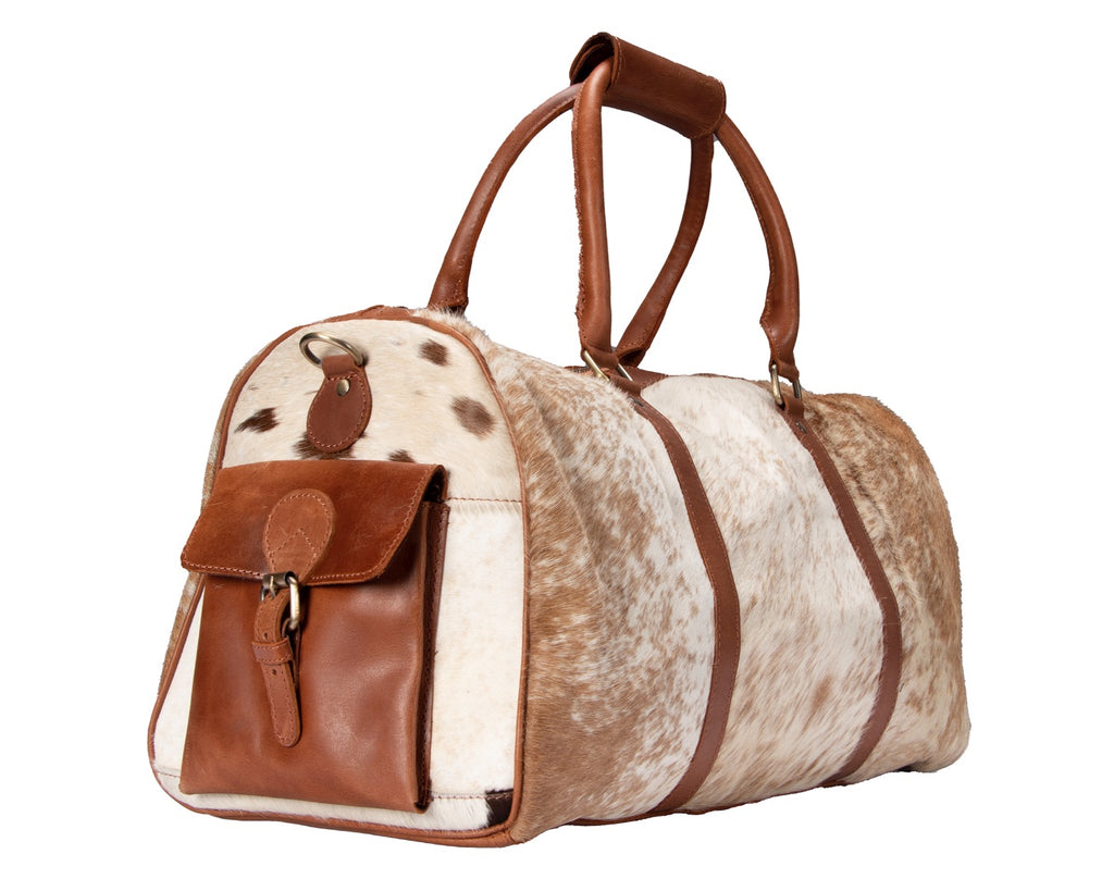 Overnight cowhide  Bag. Unisex compact travel bag with detachable shoulder strap, YKK zipper, multiple inside and outside pockets, and sturdy handles. Dimensions: W48cm x H27cm x D26cm. Exterior leather with cotton interior lining.