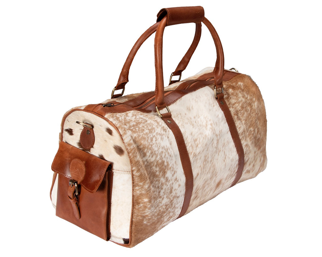 Overnight cowhide  Bag. Unisex compact travel bag with detachable shoulder strap, YKK zipper, multiple inside and outside pockets, and sturdy handles. Dimensions: W48cm x H27cm x D26cm. Exterior leather with cotton interior lining.