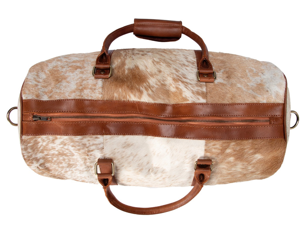 Overnight cowhide  Bag. Unisex compact travel bag with detachable shoulder strap, YKK zipper, multiple inside and outside pockets, and sturdy handles. Dimensions: W48cm x H27cm x D26cm. Exterior leather with cotton interior lining.