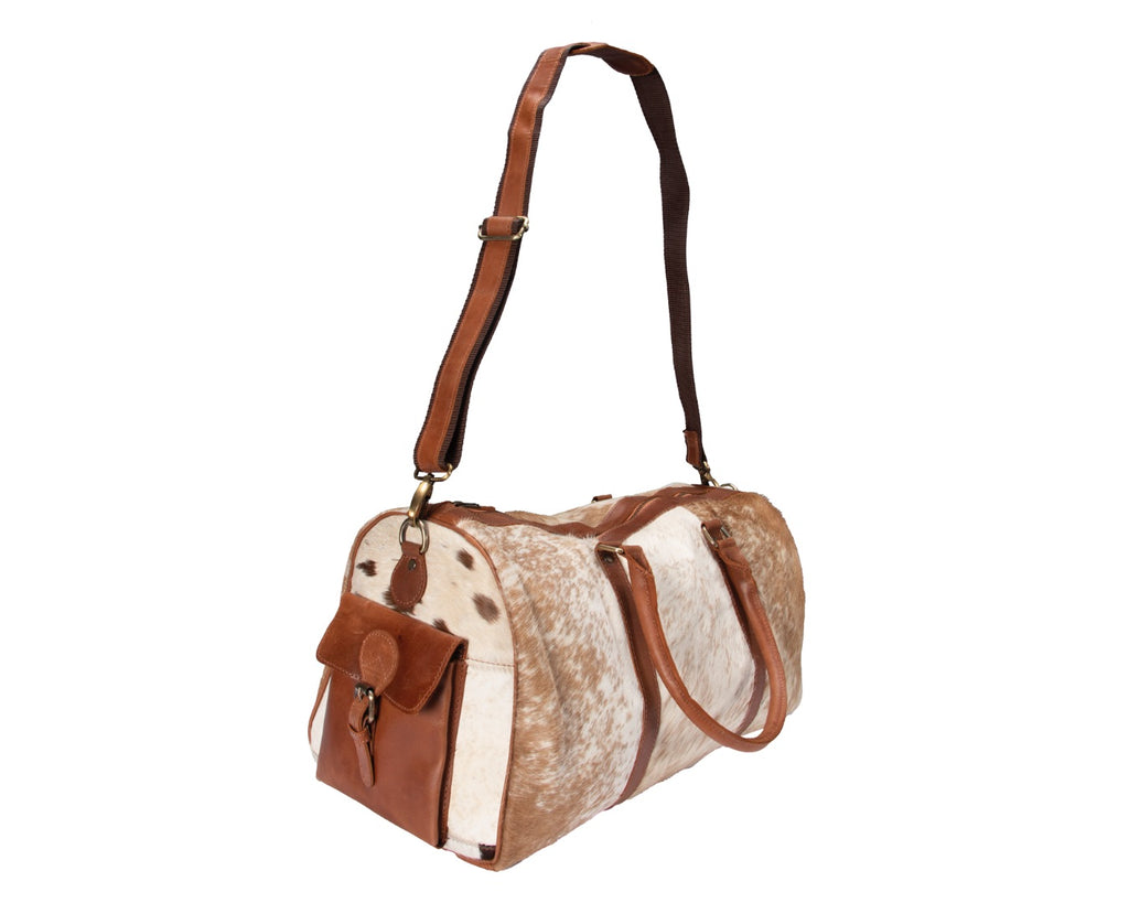 Overnight cowhide  Bag. Unisex compact travel bag with detachable shoulder strap, YKK zipper, multiple inside and outside pockets, and sturdy handles. Dimensions: W48cm x H27cm x D26cm. Exterior leather with cotton interior lining.
