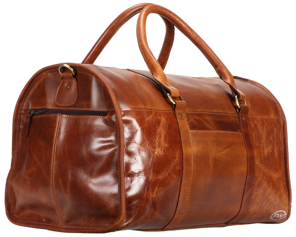 Fort Worth Distressed Leather Duffle Bag - made from high-quality leather with sturdy handles and a removable shoulder strap, this bag is perfect for any type of travel