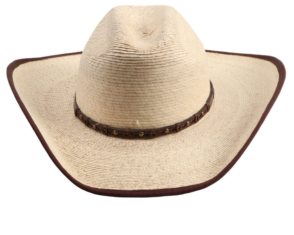 Gone Country Hats - Ponderosa Palm Leaf Hat: A close-up image of a white palm leaf cowboy hat with a brown bound edge. The hat has a 4-1/2 inch crown and a wired, shapeable brim measuring 4 inches. It features a flex sweatband and is suitable for working or playing outside. The hat is handmade, so measurements may vary slightly. Available at Greg Grant Saddlery.