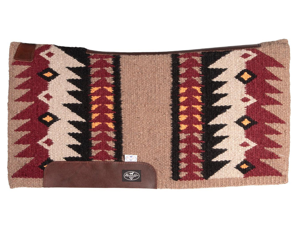 professionals choice fusion saddle pad is a combination of a hand-woven New Zealand wool blanket top and a 100% steam pressed wool felt pad, providing superior cushioning and impact protection