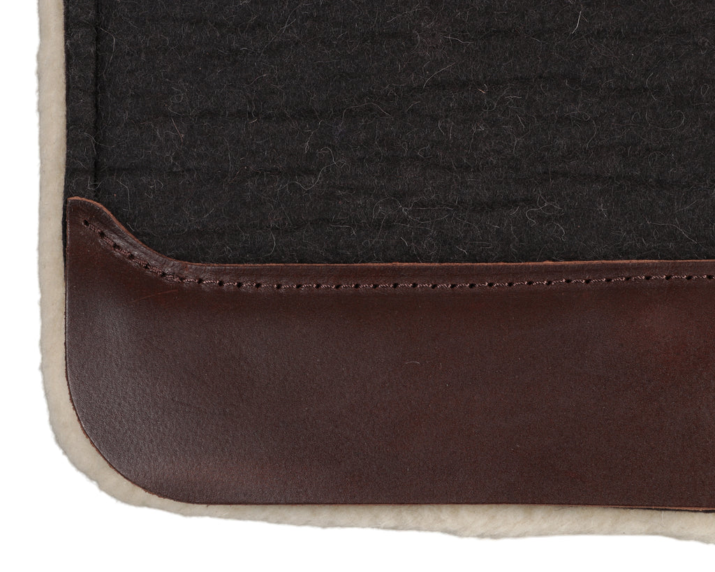 Professional's Choice Comfort Fit Wool Saddle Pad, close up of leather wear patch