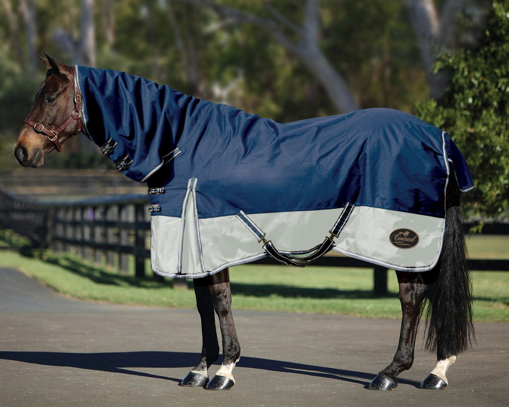 Conrad Horse Rug Combo, featuring its strong 1200 Denier outer and 200-gram polyfill for warmth and protection. The seamless design helps keep the rain out, while the large shoulder gussets allow for freedom of movement and prevent rubbing. The combo also includes a large tented tail flap with a gusset for enhanced fit and tail protection. Premium quality hardware ensures durability.