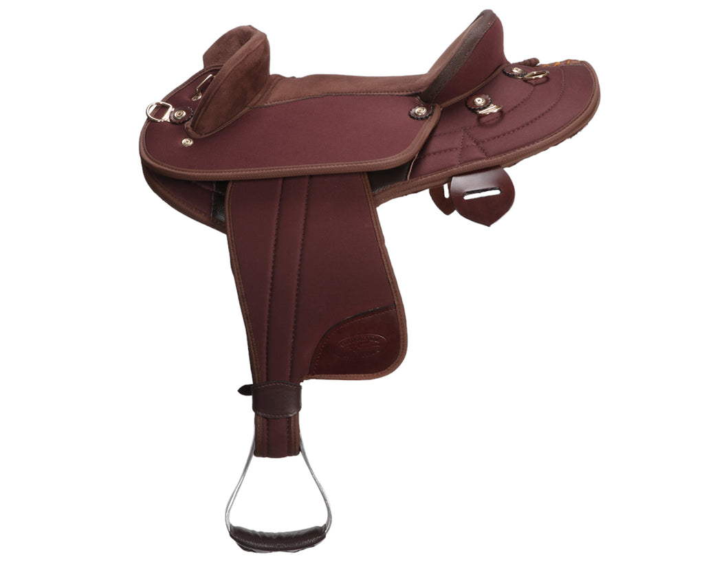 Ord River Synthetic Youth Half Breed Saddle, also known as a Swinging Fender Stock Saddle, image showing side view of saddle