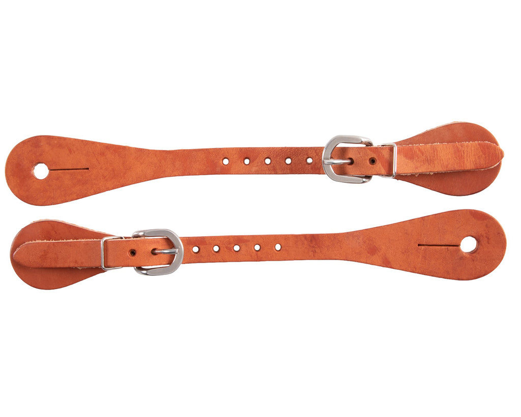 A pair of Professional's Choice Sagebrush Spur Straps made of high-quality leather. The classically shaped leather complements any riding attire and is suitable for both show ring and everyday riding. The spur straps have stainless steel buckles for secure fastening and are durable for ranch or trail riding. These stylish and practical spur straps are a must-have accessory for any equestrian.