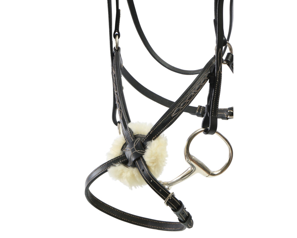 Sterling Figure Eight Bridle with Reins. Fancy stitched, raised and padded browband and noseband. Soft fleece lining on the noseband. Stainless steel hardware. Continental webbing reins.