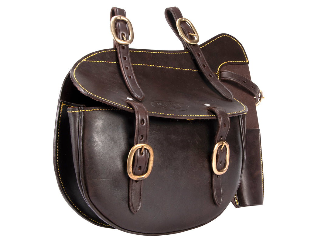 Fort Worth Stockman's Saddle Bag with Pliers - A brown leather saddle bag with adjustable straps. The bag features a separate pouch for holding pliers or fencing tools. Durable and spacious, it is designed for outdoor use and offers convenience for stockmen and outdoor enthusiasts.