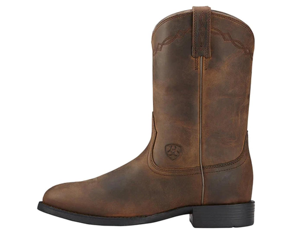 Heritage Roper Womens Boots in a Distressed Brown with Decorative stitching at the front along with the Ariat Logo stamped on. With a rubber outsole and heel.