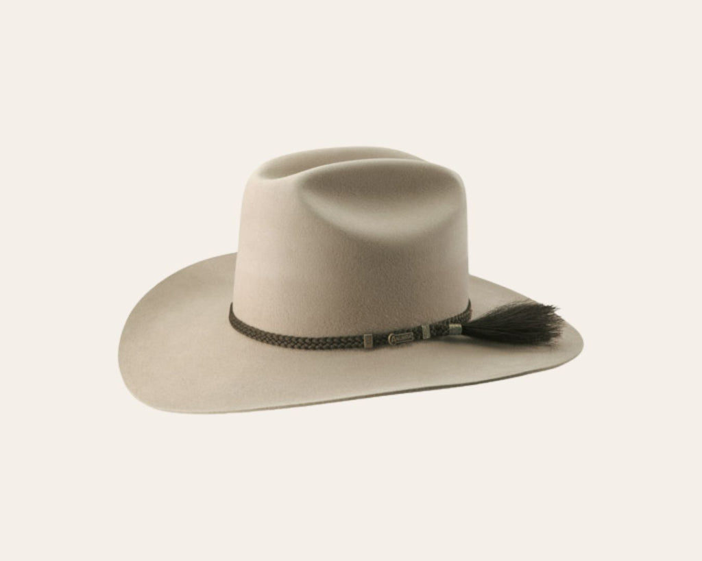 Akubra Arena  Western hat featuring a tall, centre-creased western crown and a broad, upswept brim sand